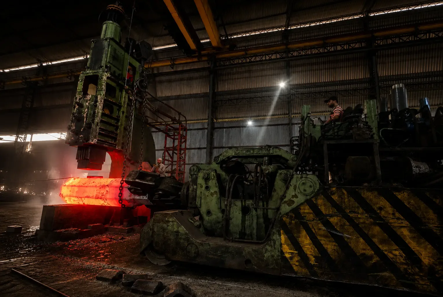 Industrial forge with glowing hot metal
